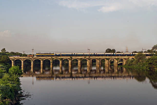 istock Super fast Intercity express train passing over Harris bridge, Pune. 1277395027