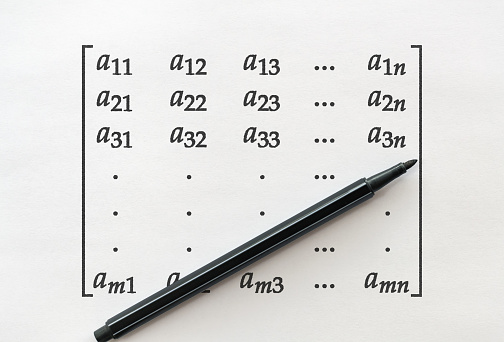 General form of matrix and a felt pen on bright background