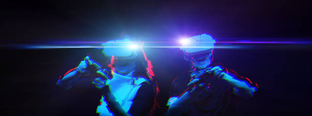 istock Couple with virtual reality headset are playing game. Image with glitch effect. 1277396040