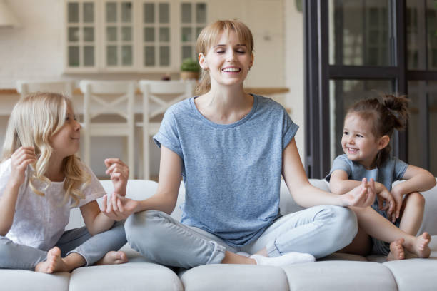 istock Relaxed mom enjoying quiet moment with kids 1277398377