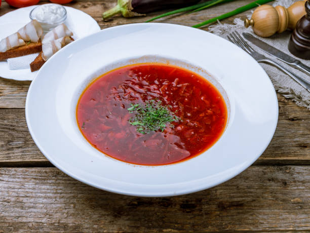 istock Borscht with sour cream on old wooden table 1277399135