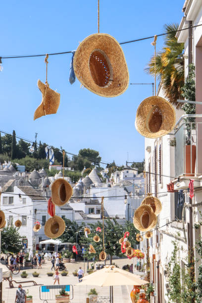 Hanging decoration Alberobello Italy Hanging hats Puglia Italy alberobello photos stock pictures, royalty-free photos & images