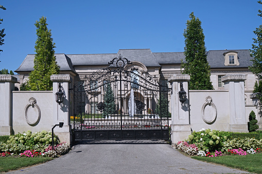 Toronto, Canada - August 13, 2020:  The Bridle Path area has large gated estates with, with some of the mansions modelled after European palaces.