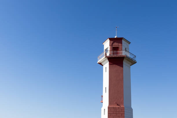 istock lighthouse with a blue sky in a sunny day 1277408967