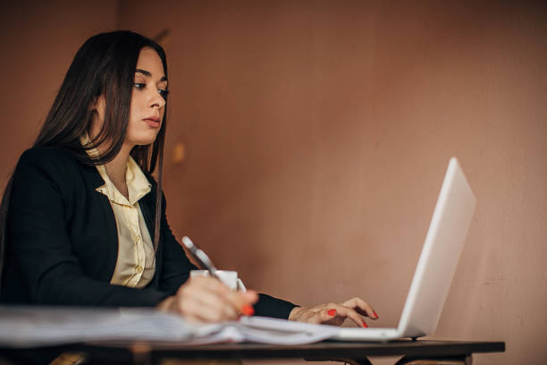 istock Young woman working from home 1277411265