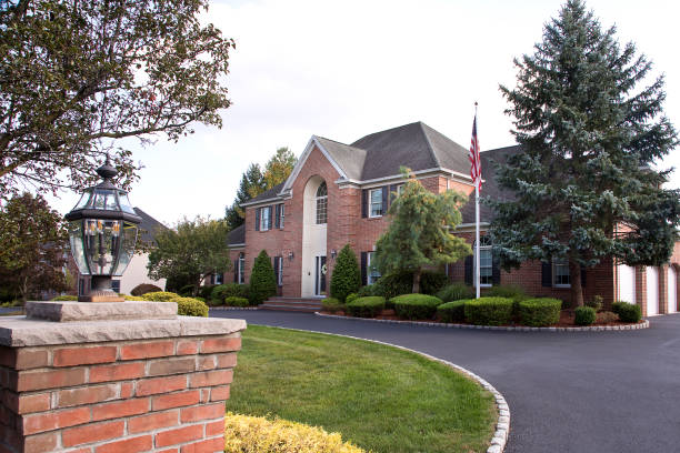 istock Large house three quarter view in affluent neighborhood 1277411503