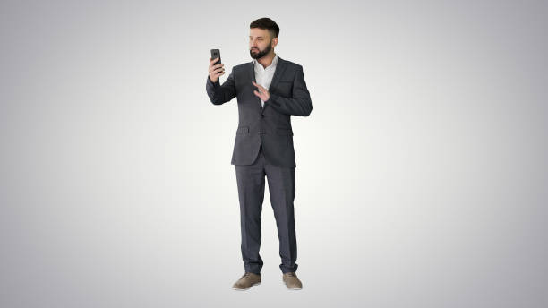 istock Handsome turk businessman making a video call with his smartphon 1277411823