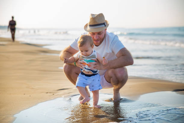 istock Father and son at the beach 1277415295