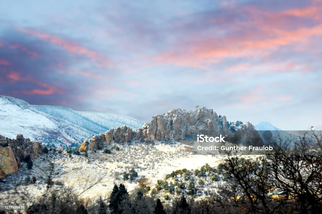 Garden of the Gods, Colorado after a winter dusting. A stunning landscape view of the Garden of the Gods after a winter dusting on the stark sandstone cliffs. Colorado Springs Stock Photo