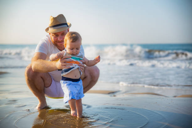 istock Father and son at the beach 1277415896