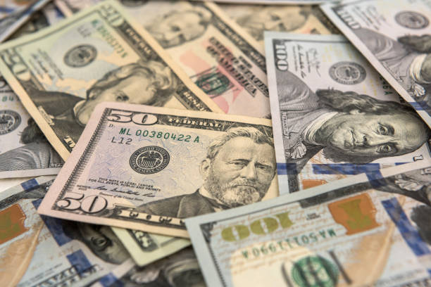 istock money background. dollar bills cash 1277418566