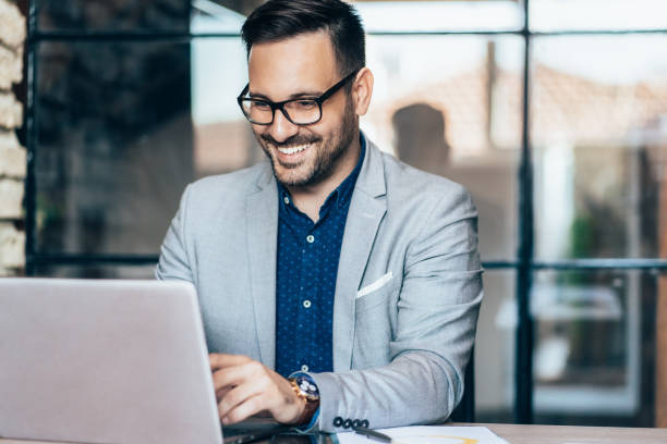 istock Young businessman working at office 1277420523