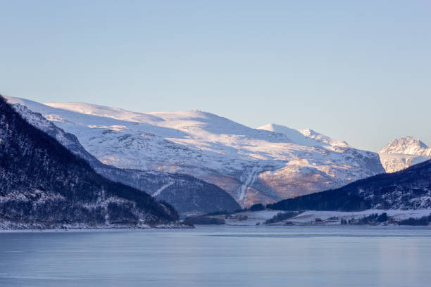 istock Winter landscape with mountains and sea, Norway 1277421616