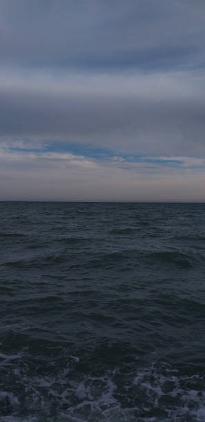 istock relaxing sea landscape with clouds and waves 1277424362