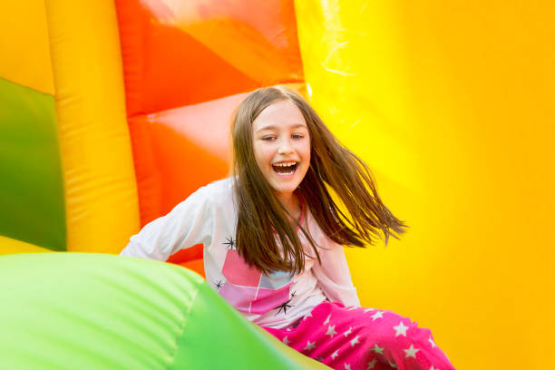 istock Happy Girl on Inflate Castle 1277424455