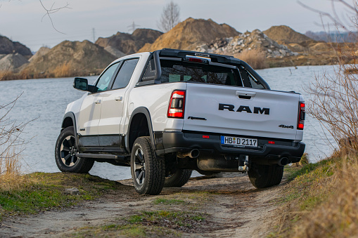 Berlin, Germany - 12 January, 2020: RAM 1500 Rebel stopped next to lake. RAM is one of the most popular pickup vehicles in North America.