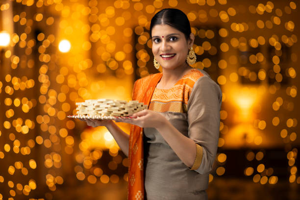 istock young women celebrate diwali 1277427196