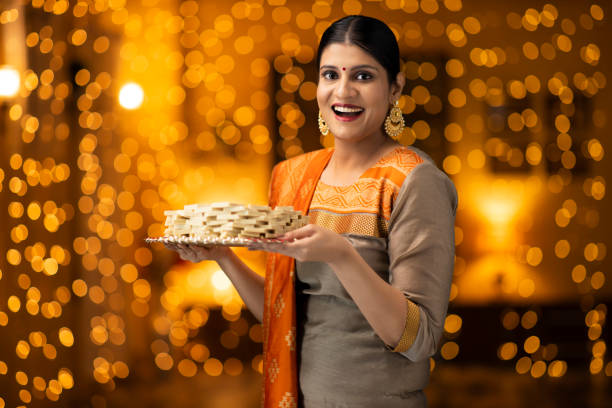 istock young women celebrate diwali 1277427222
