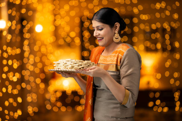 istock young women celebrate diwali 1277427244