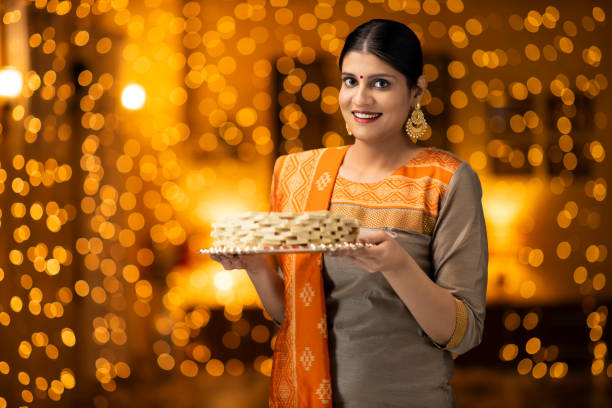 istock young women celebrate diwali 1277427291