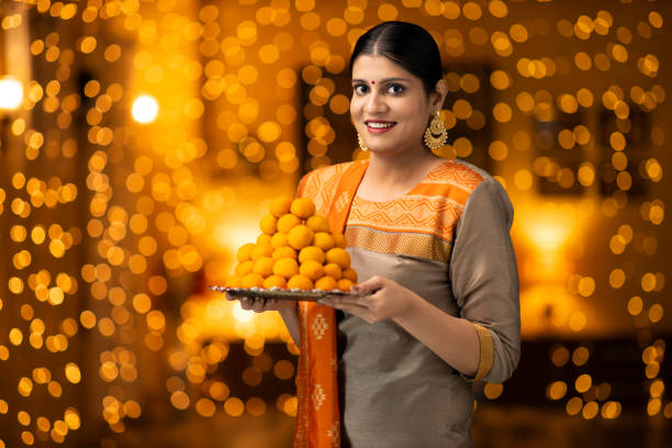istock young women celebrate diwali 1277427898