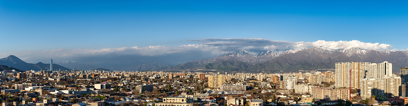 Elevated panorama photo of Santiago de Chile with the snowy Andes as background