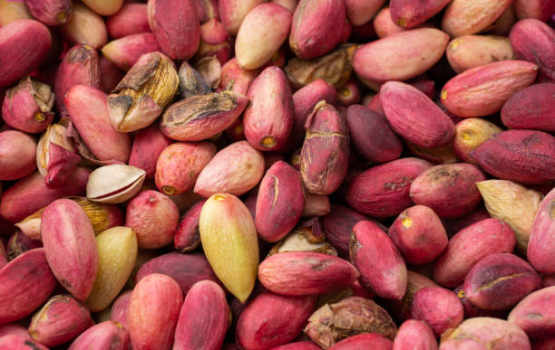 istock unpeeled fresh pistachios for sale 1277428202