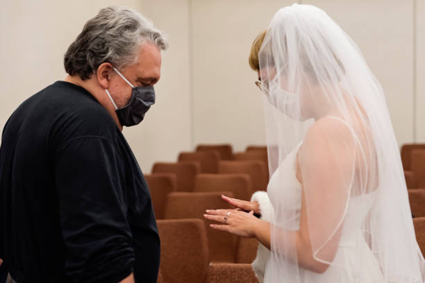 istock Newlywed bride showing father her engagement ring after wedding. 1277432638
