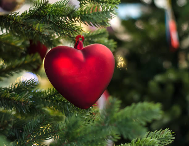 istock Christmas tinsel with a red toy 1277432748