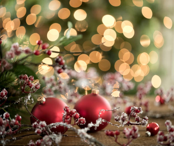istock Christmas Baubles against a Defocused Christmas Tree 1277434475
