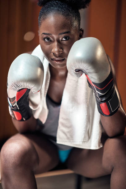 istock A young female boxer posing ready for a fight 1277434568