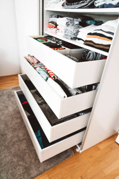 istock Vertical photo of open closed drawers 1277434702