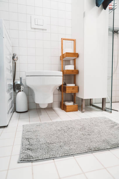 istock Vertical photo of small modern white bathroom 1277434706