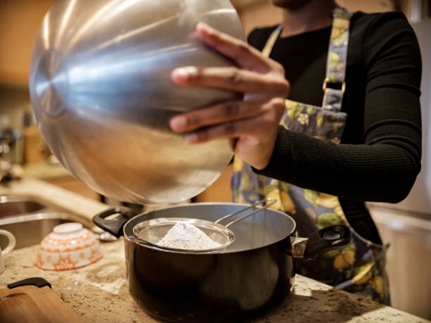 istock Hands of Young woman baking 1277434743