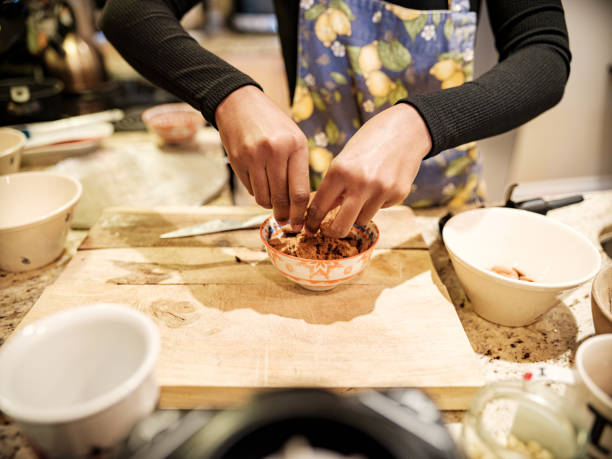 istock Hands of Young woman baking 1277434760