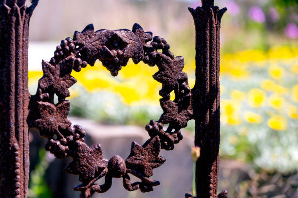 An iron bell with a heart in the garden (Pesaro, Italy)
