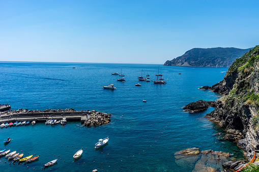 Vernazza, Cinque Terre, Italy - 27 June 2018: Boats docked near the shore at Vernazza, Cinque Terre, Italy