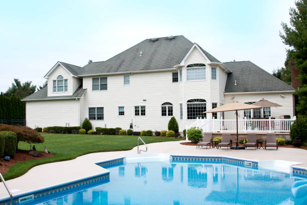 istock Large house late Summer, rear view with swimming pool 1277444326