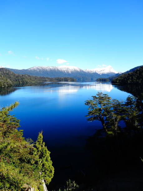 istock Snowy mountains reflected in the water 1277451899
