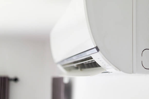 istock Air conditioner on white wall room interior background 1277453010