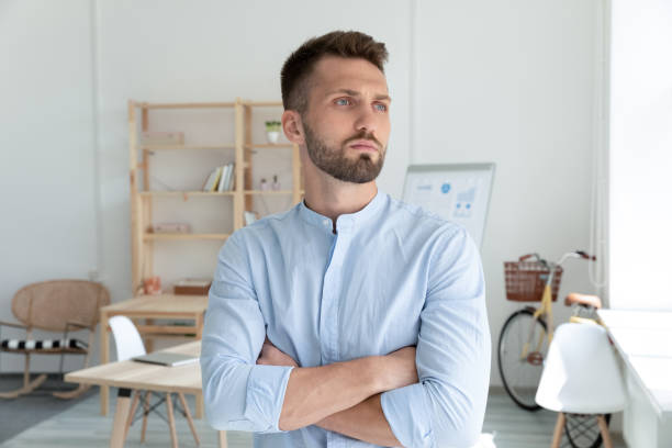 istock Head shot confident young businessman startup owner pondering strategy 1277453952