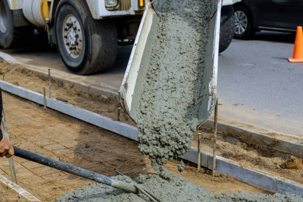 istock Construction of new sidewalks laying concrete cement 1277462088