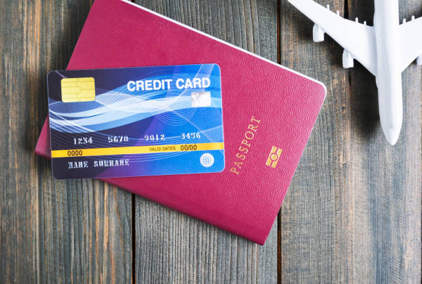 istock Credit card put on passport on wooden table 1277471320