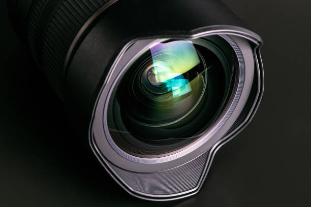 istock Camera lens on a black background. Wide-angle close-up lens. Macro 1277475879