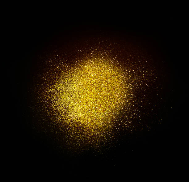 istock Sparkling golden glittering effect isolated on black background. 1277478960