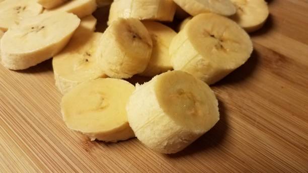 istock sliced plantain banana on wood cutting board 1277479005