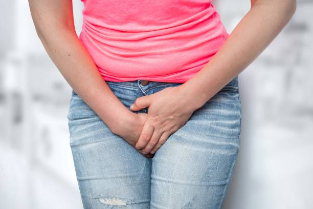 istock Woman with hands holding her crotch, she wants to pee 1277479656