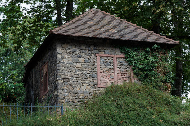istock Old stone house in a park 1277485083