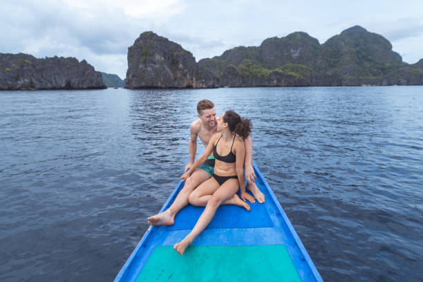 istock Mixed race couple on tropical boat tour 1277485420