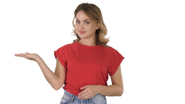 istock Woman presenting product with her hand showing to side on white 1277486108